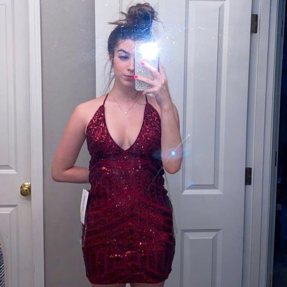 promgirl red sequin dress.